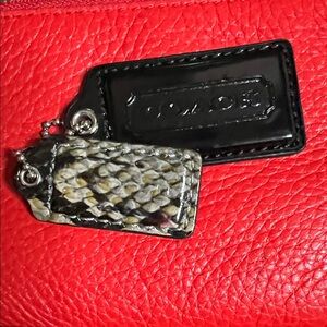 Coach Black Leather hangtag with a Snakeskin hangtag